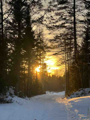 snowmobiling sunset